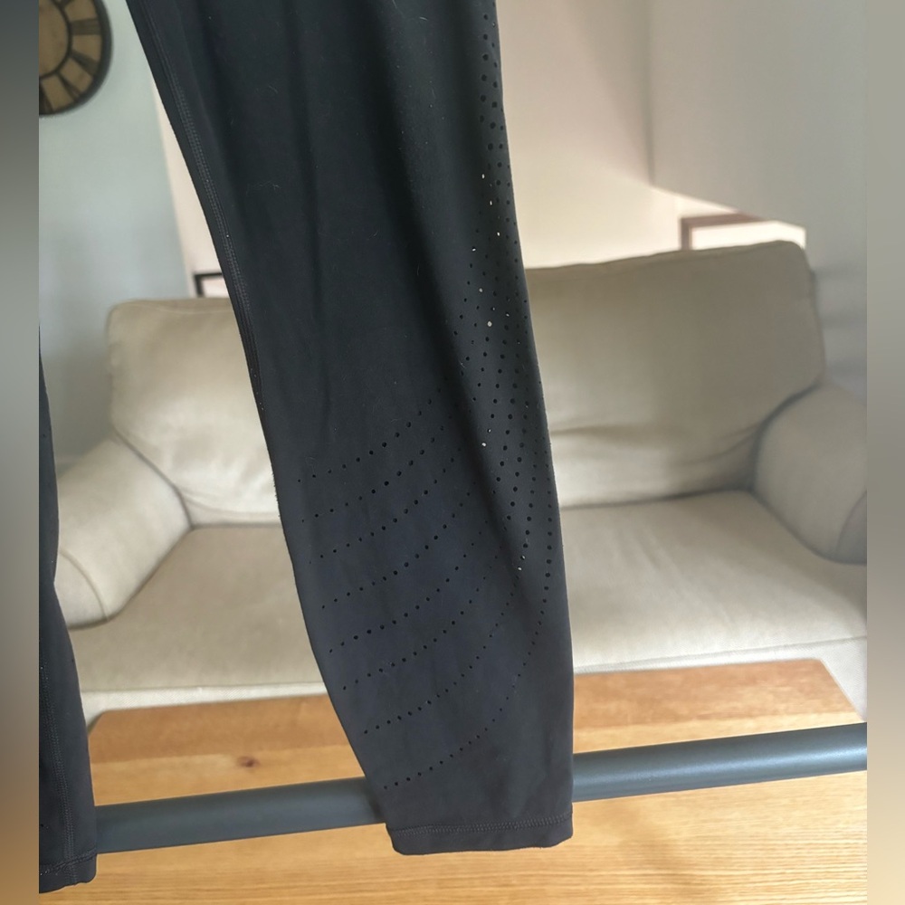 Athleta laser cut leggings, black size small.